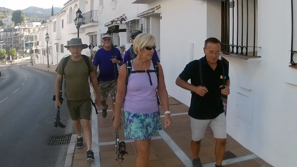 walking guide leading a group through the streets