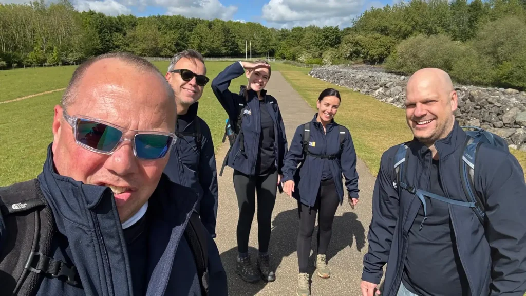 Involved Holidays team walking around Rutland Water during the 26.2-mile LOROS Hospice charity walk, May 2026