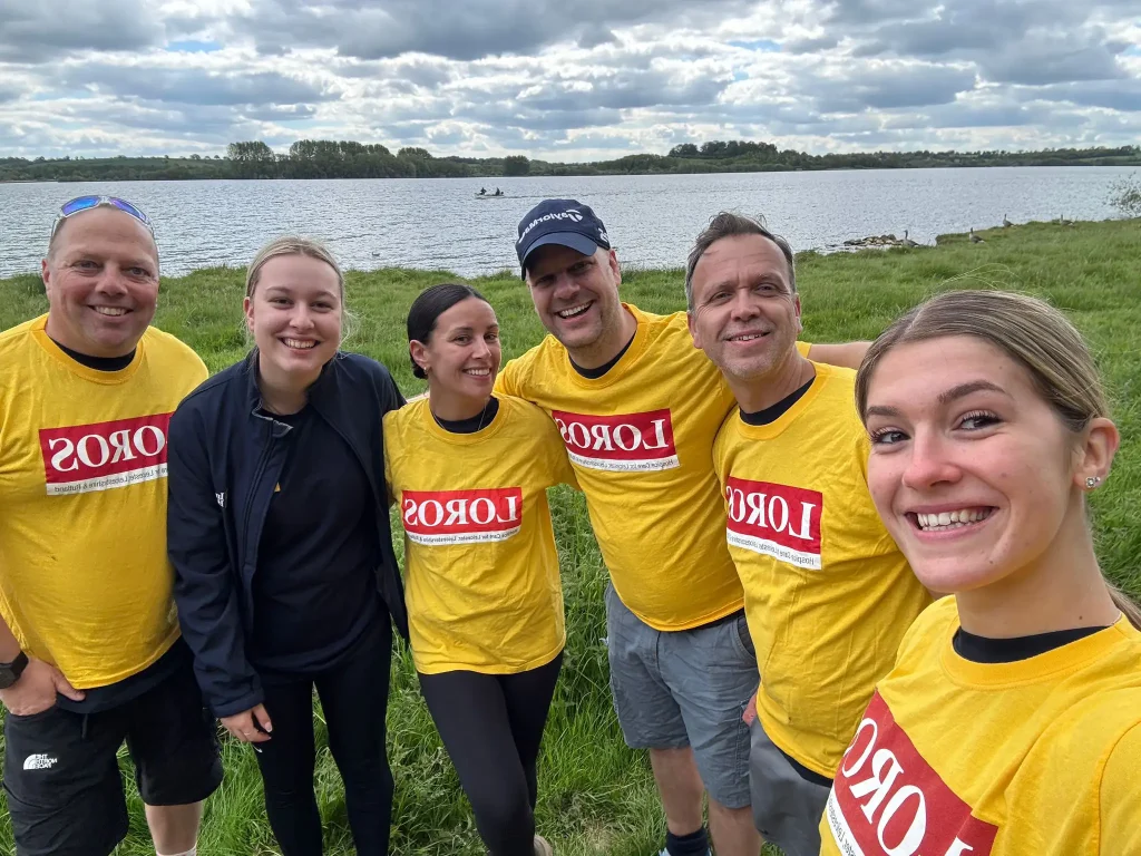 Involved Holidays team walking around Rutland Water during the 26.2-mile LOROS Hospice charity walk, May 2026